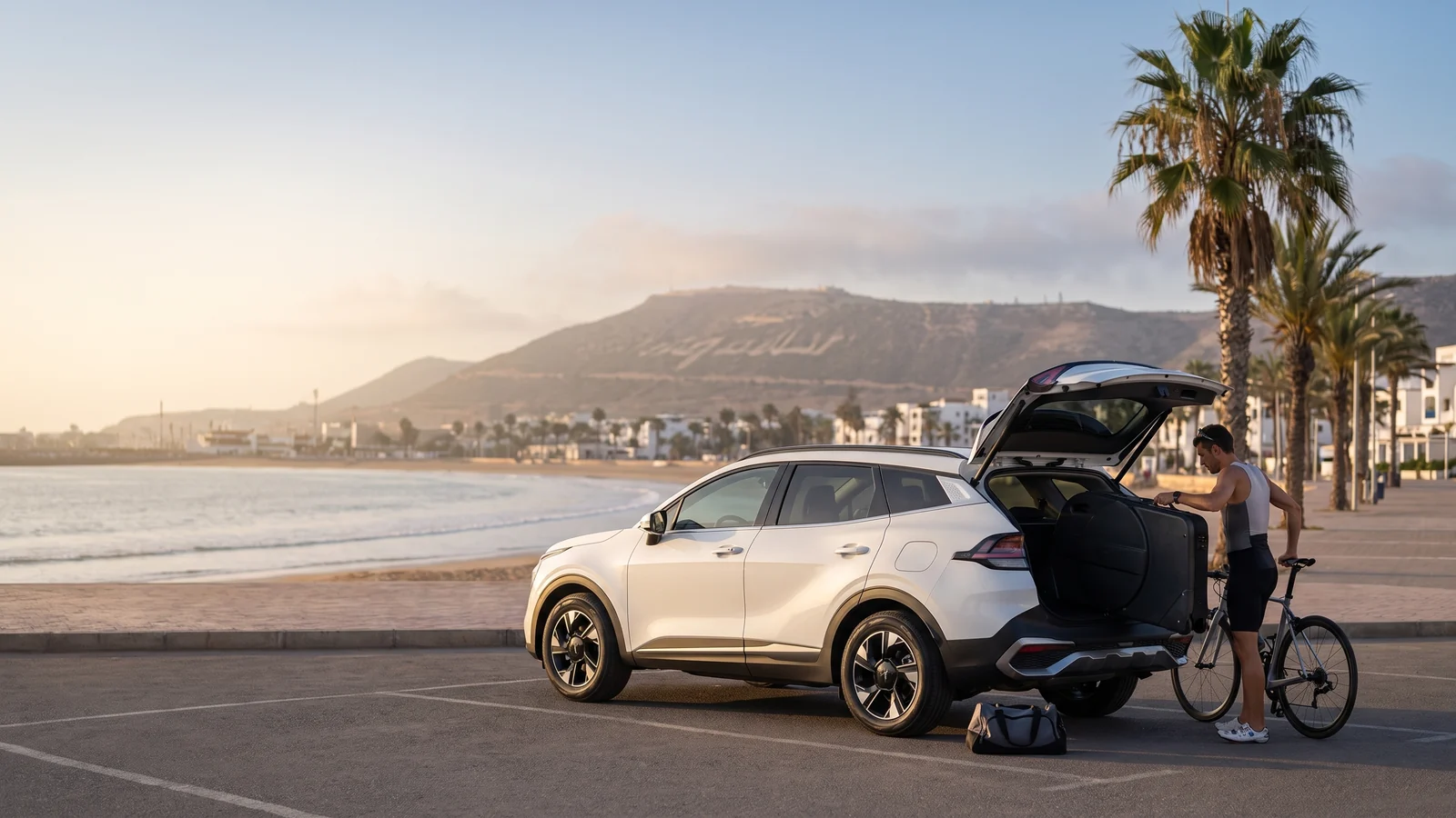 GadiWaze rental car on the Agadir seafront during IRONMAN 70.3